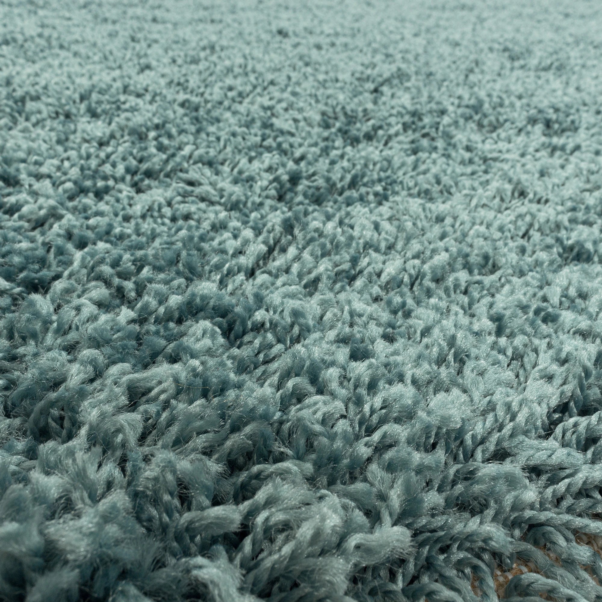 Tappeto shaggy in peluche turchese ad pelo alto