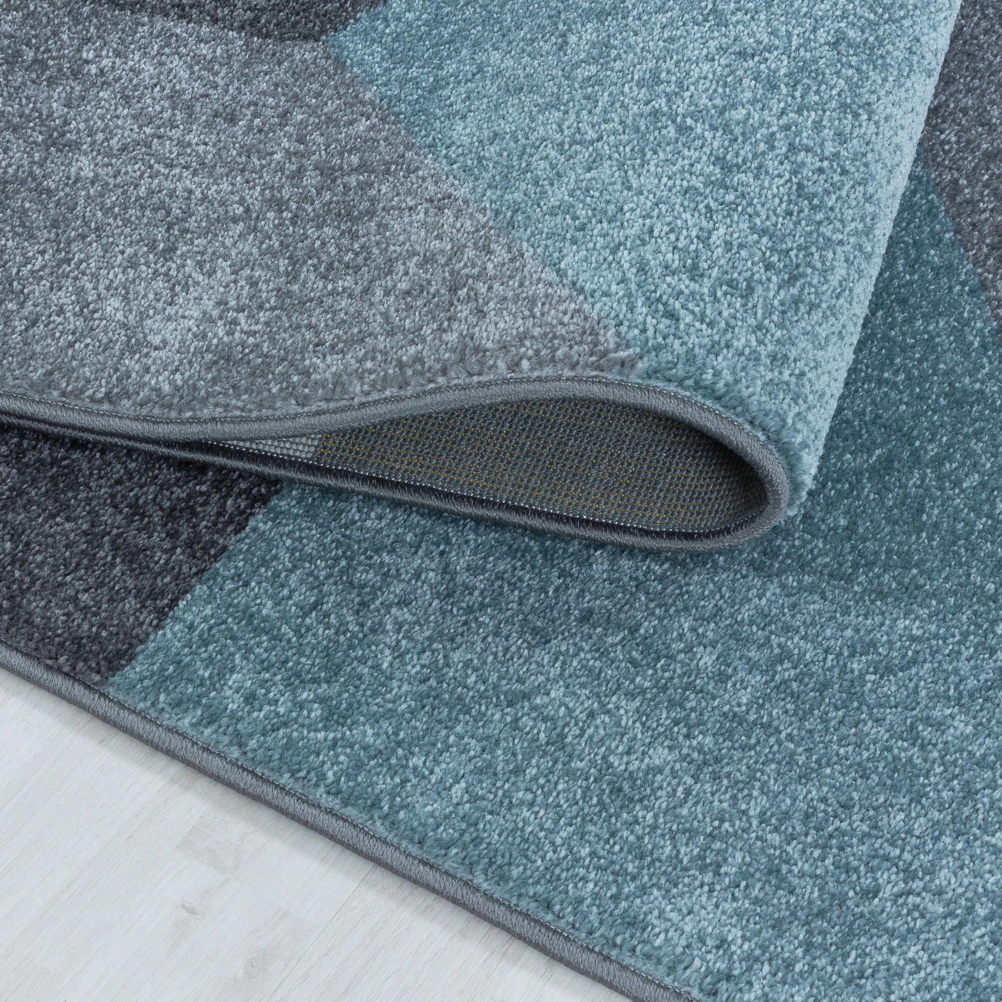 Modern Geometric Triangle Patchwork Area Rug | Blue