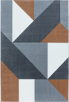 Modern Geometric Triangle Patchwork Area Rug | Copper Copper