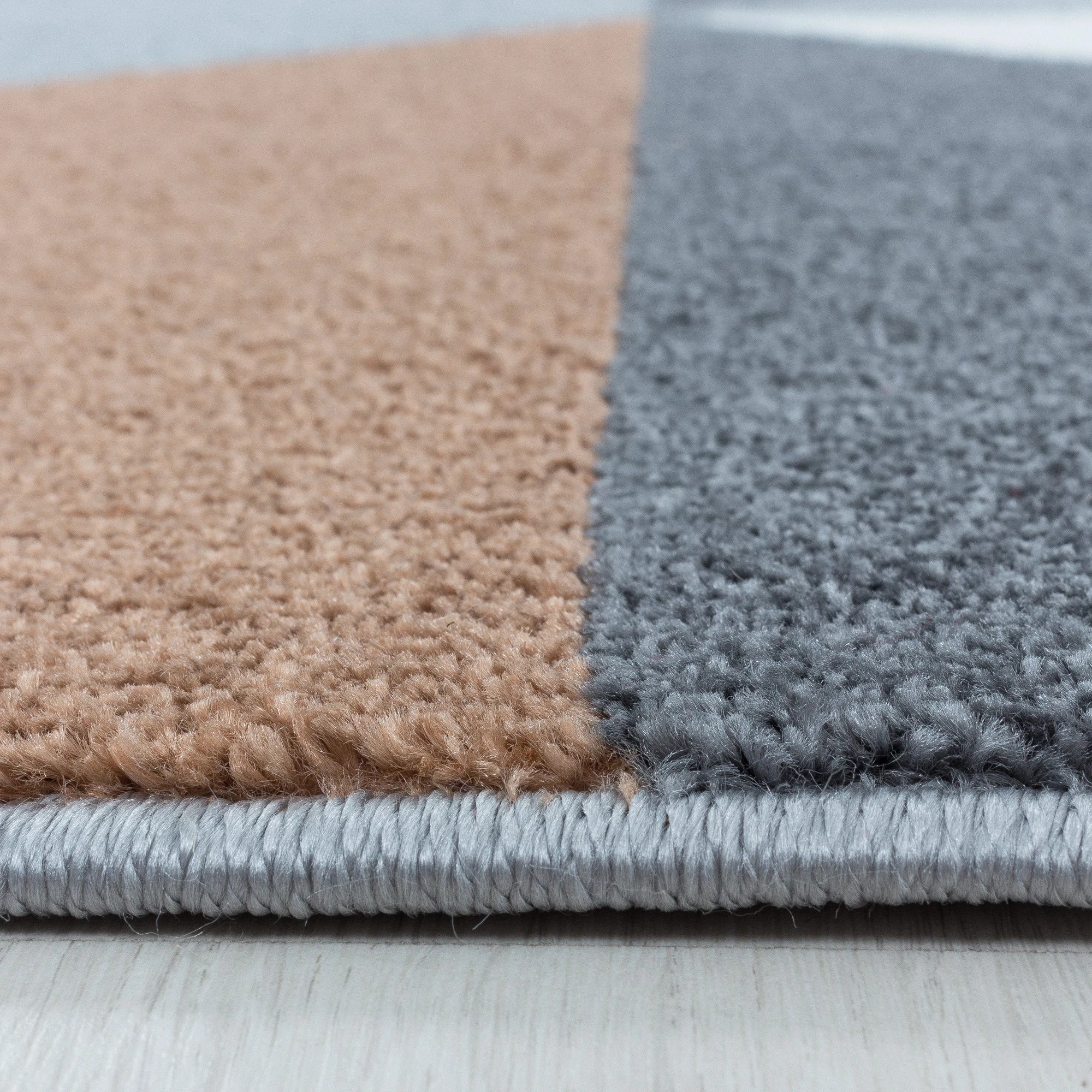 Modern Geometric Triangle Patchwork Area Rug | Copper