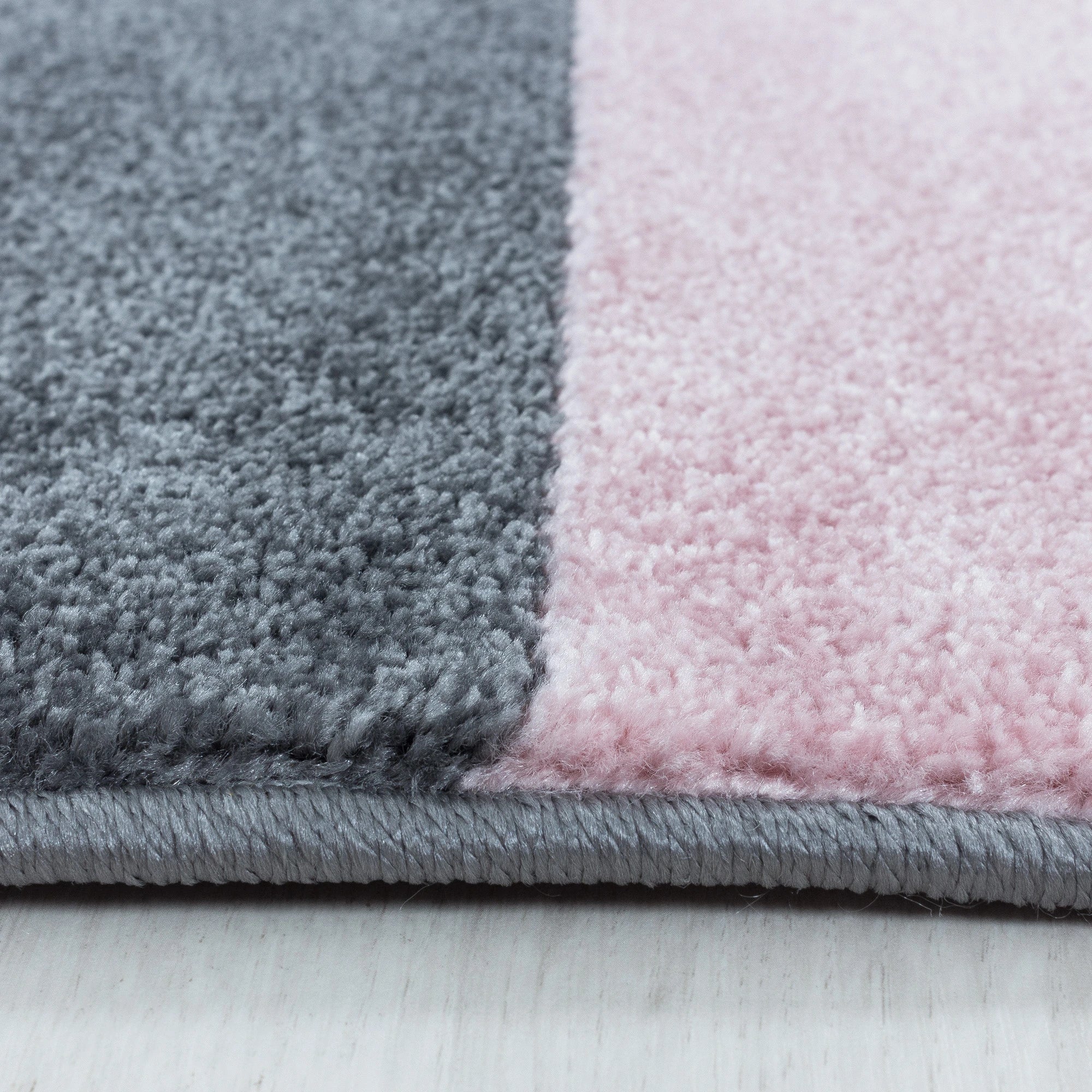 Modern Geometric Triangle Patchwork Area Rug | Pink