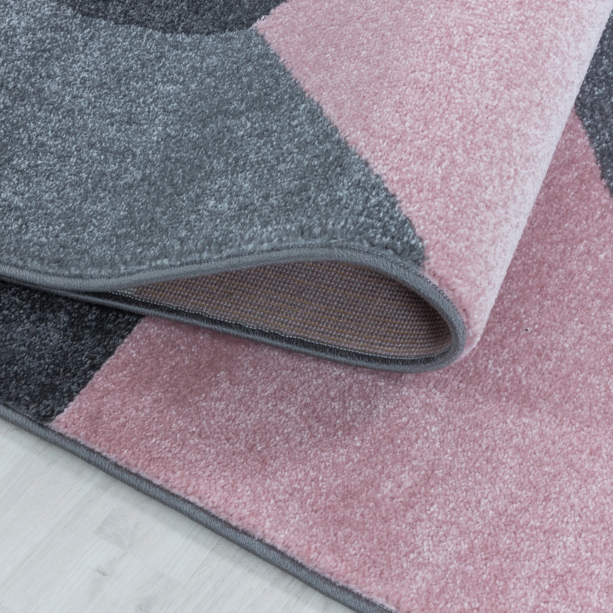 Modern Geometric Triangle Patchwork Area Rug | Pink