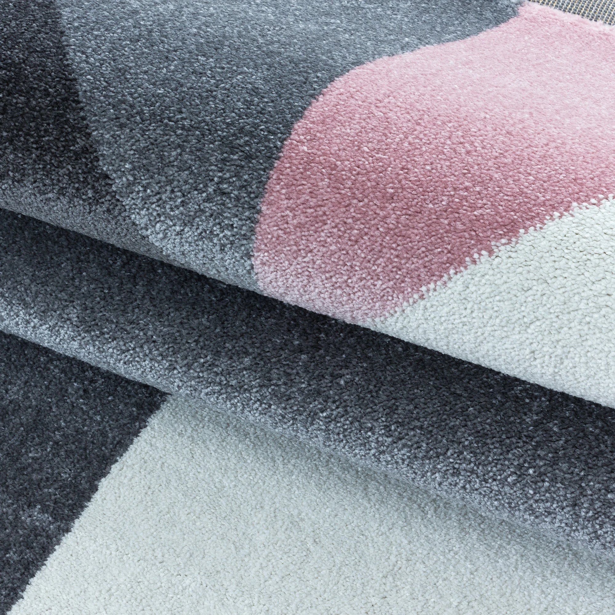 Modern Geometric Triangle Patchwork Area Rug | Pink