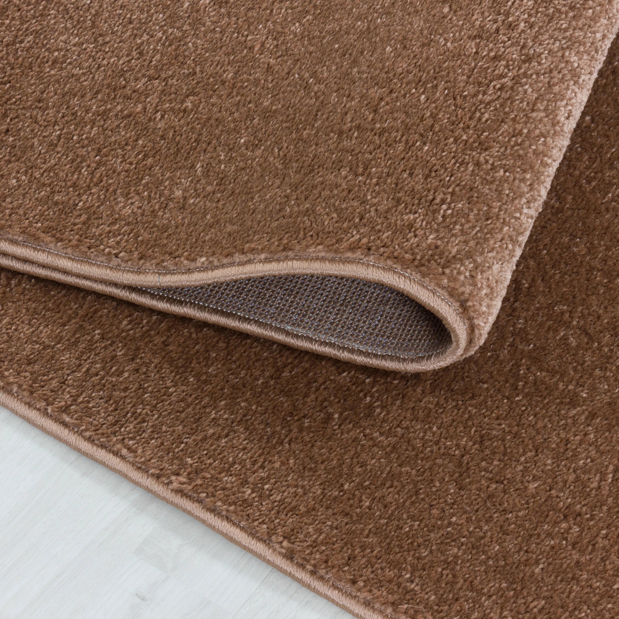 Soft Velvet Look Plain Area Rug | Copper