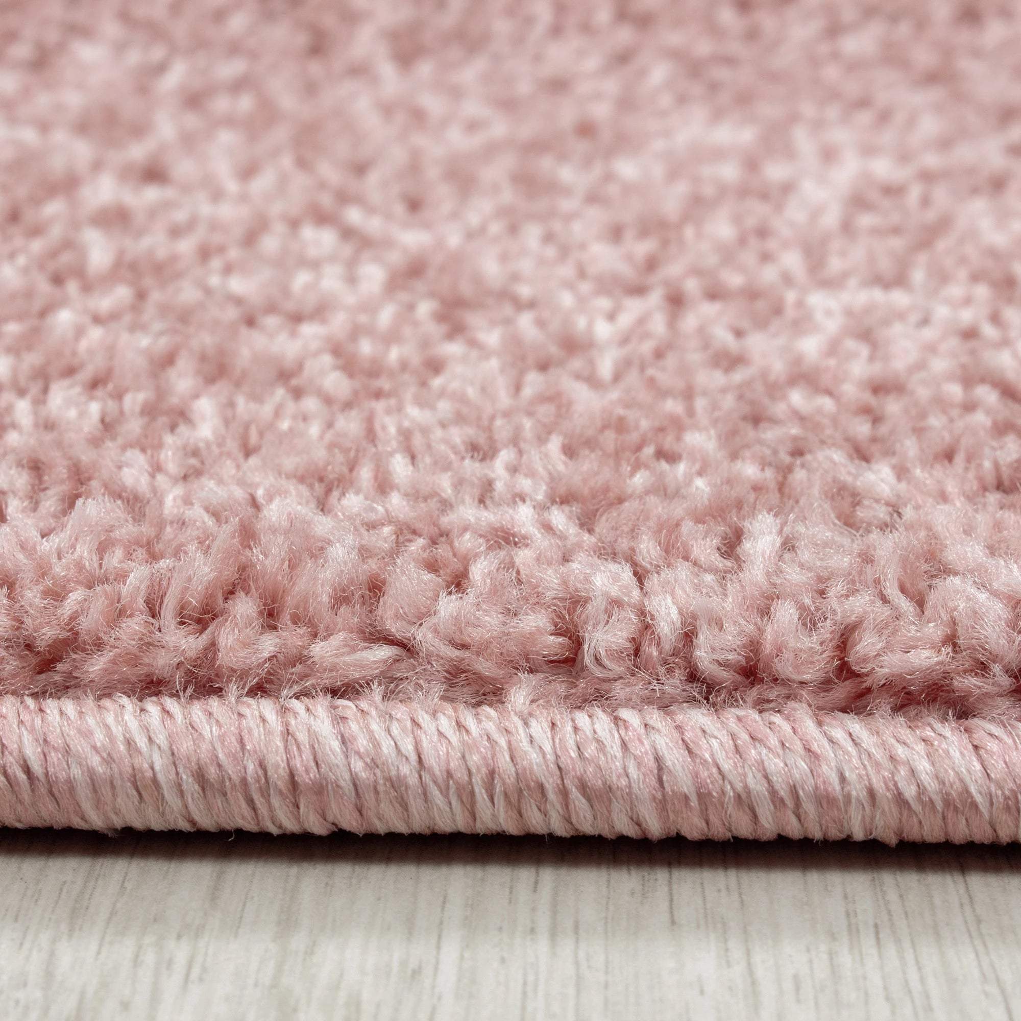 Solid Rose Plush Weave Area Rug