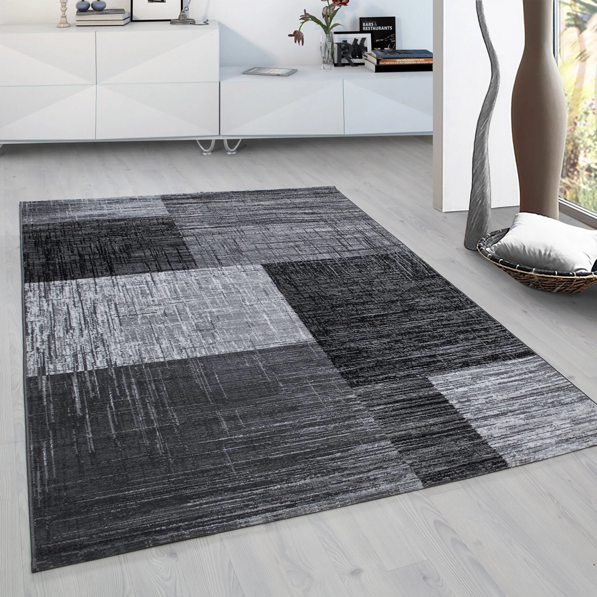 Modern Geometric Patchwork Area Carpet | Black