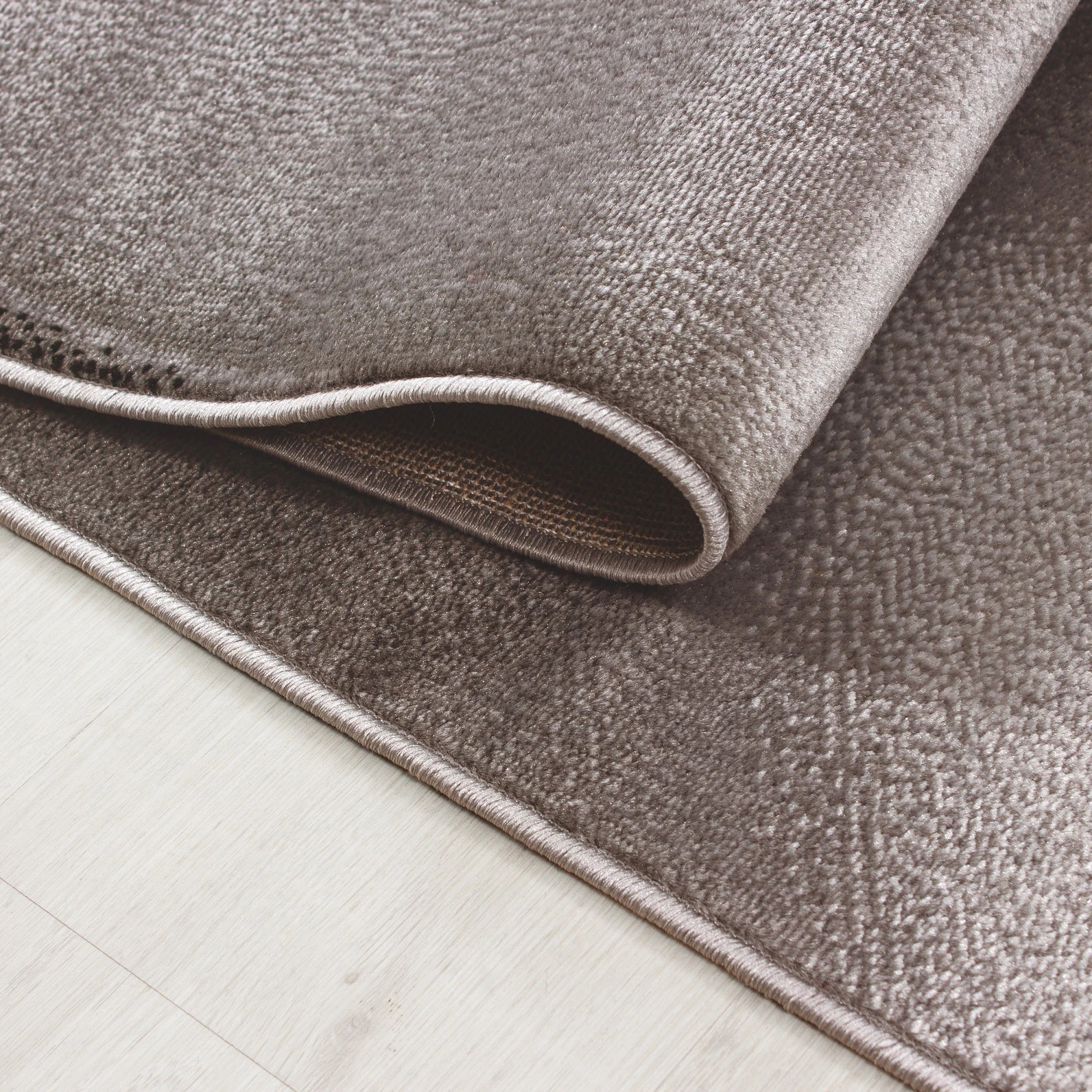 Modern Sculpted Flowing Living Room Carpet | Brown