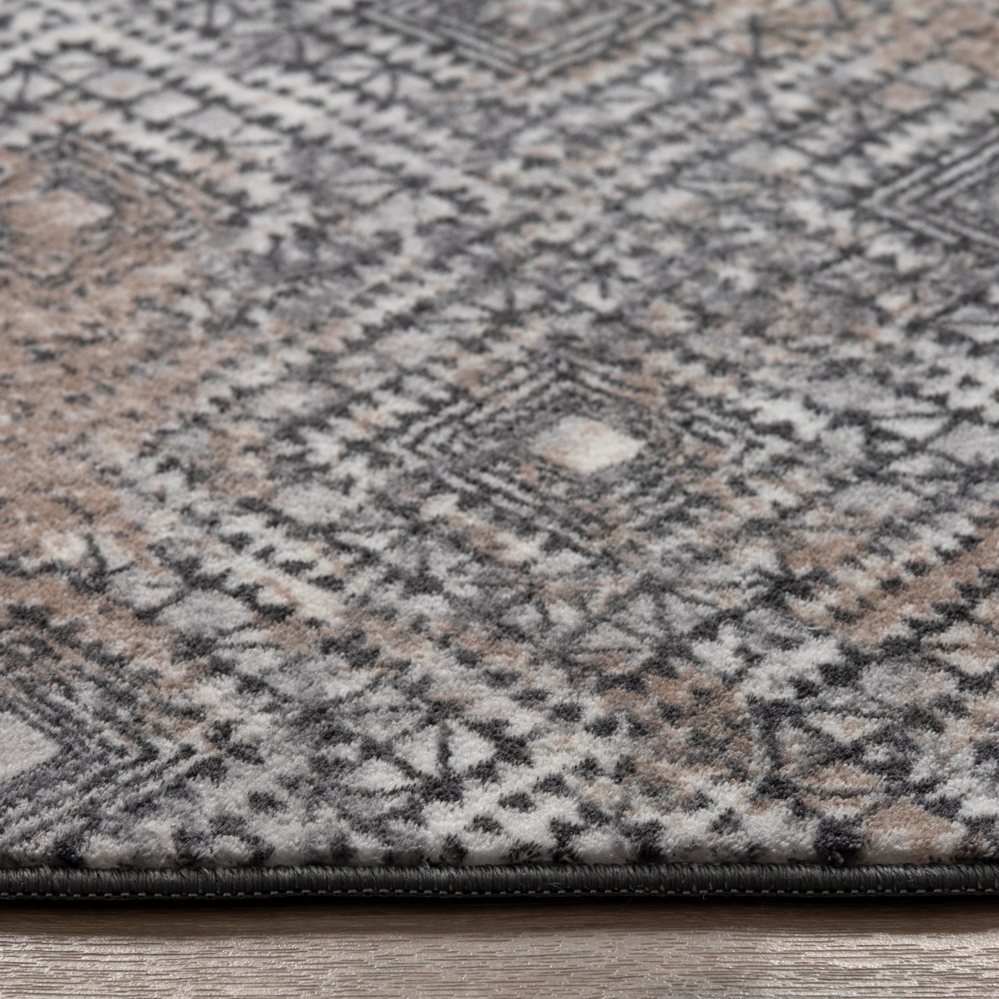 Geometric Gray Rug with Distressed Details