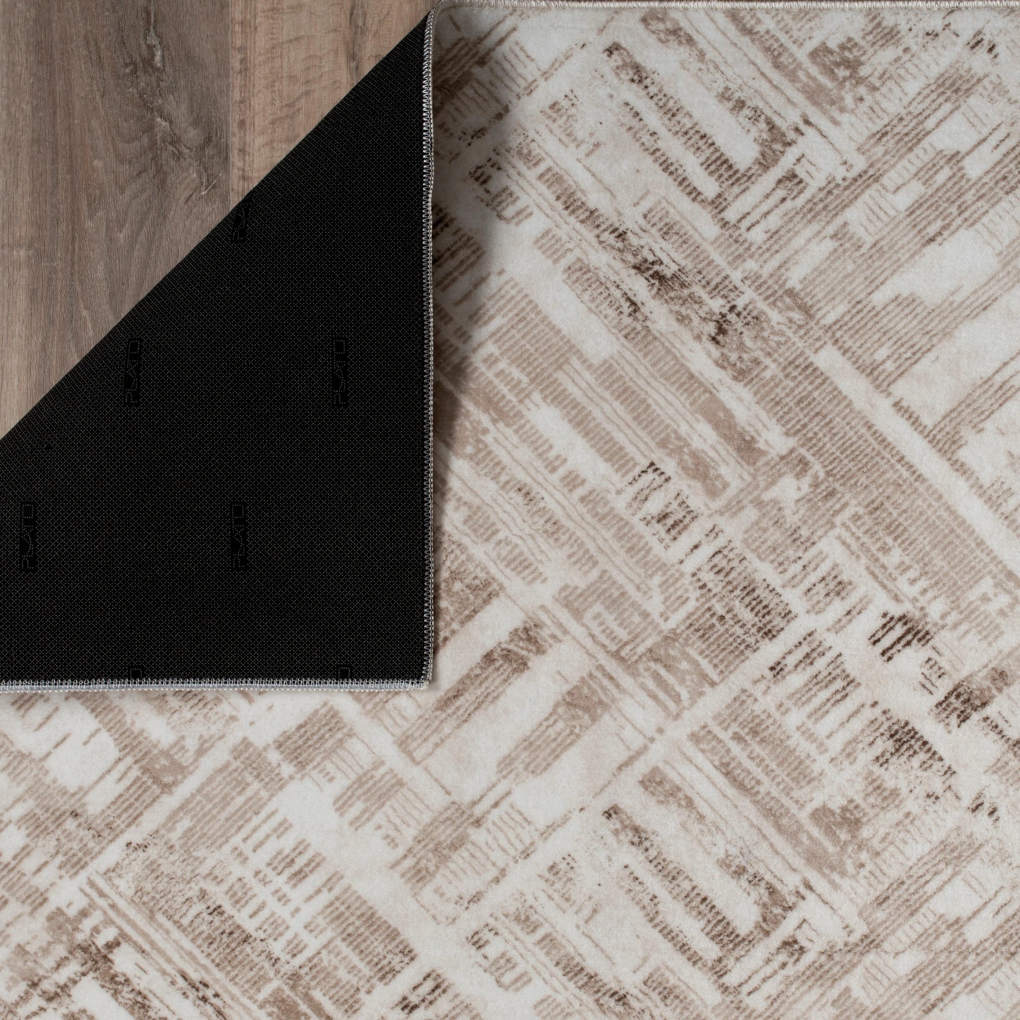 Beige Rug with a Distressed Patchwork Effect