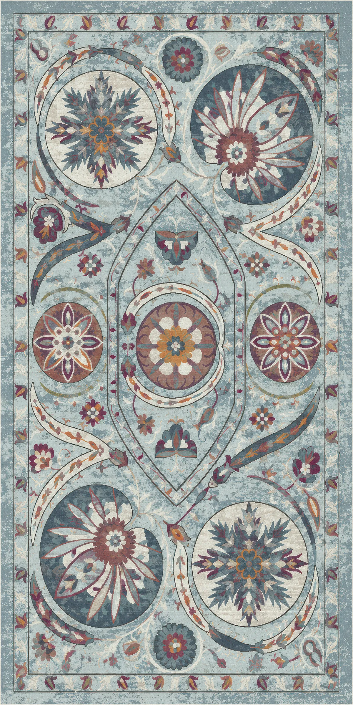 An area rug featuring a complex, symmetrical bohemian floral and geometric pattern in muted shades of blue, beige, rust red, and gray.