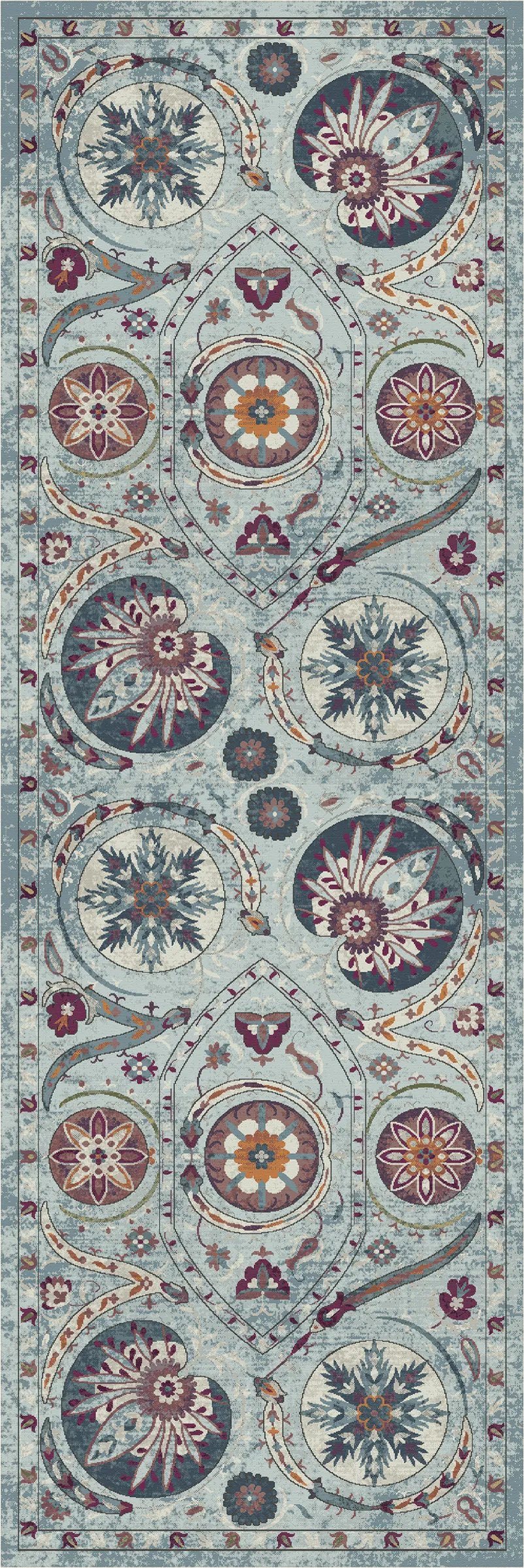 An ornate rectangular area rug with a detailed medallion and floral pattern in muted blue, gray, burgundy, and gold tones.