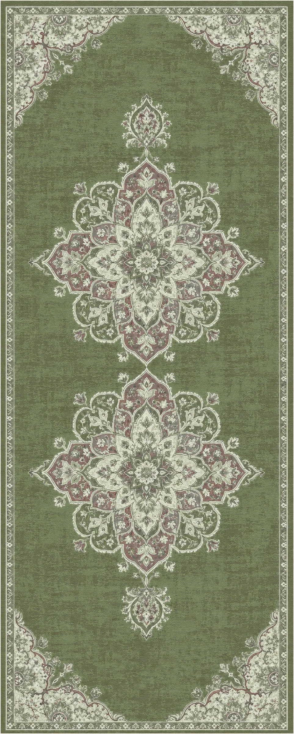 Un tappeto da salotto con un tradizionale motivo orientale, caratterizzato da un fondo verde salvia con due grandi medaglioni centrali color rosa cipria e crema, e da un bordo coordinato color crema.