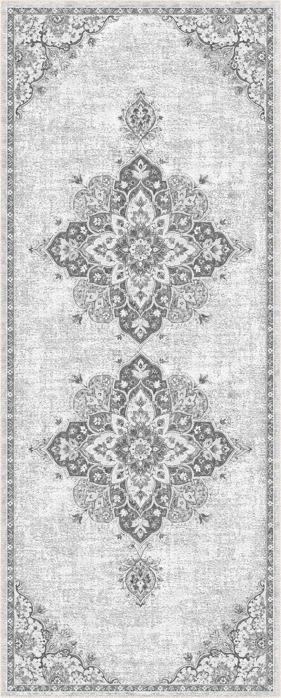 Un tappeto rettangolare per interni con un motivo tradizionale in stile vintage dall’aspetto vissuto, nei toni del grigio, del beige e del bianco sporco.