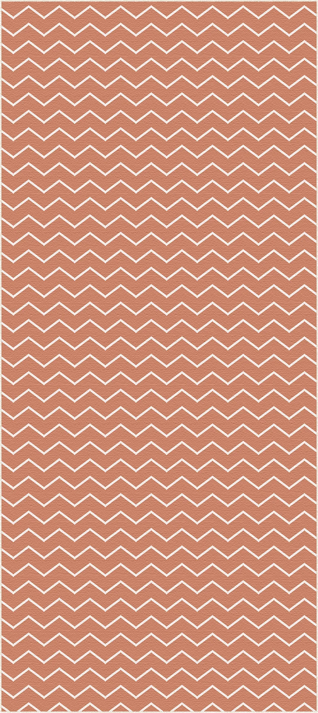 tappeto con sfondo terracotta e motivo a zigzag a chevron bianco