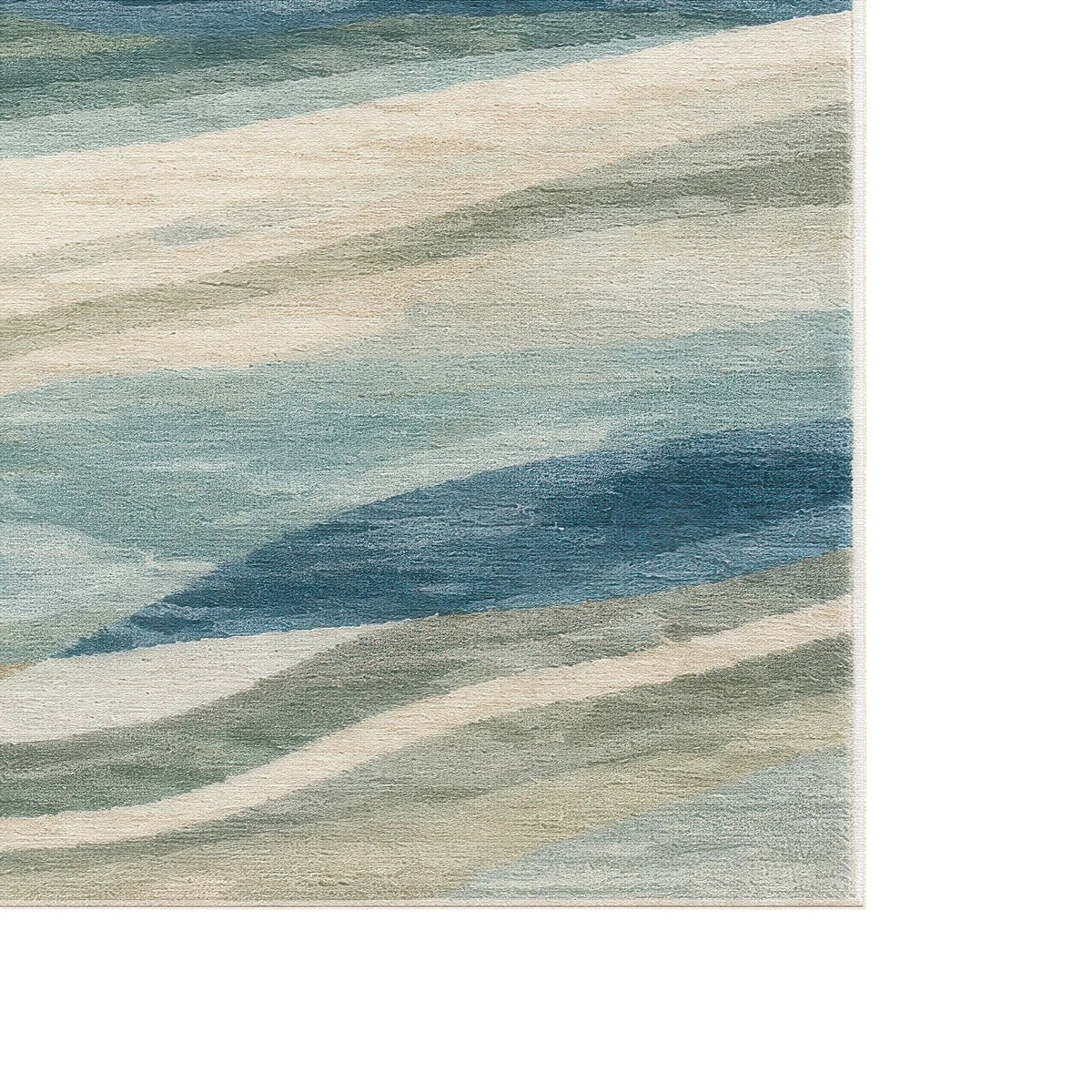 Tappeto da area astratto con un motivo simile all’acquerello in tonalità di blu, beige e grigio, mostrato ritagliato per mettere in risalto la texture e il motivo.